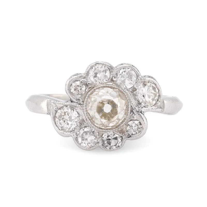 Women’s ring set-Mid Century .99 carat diamond platinum flower cluster ring