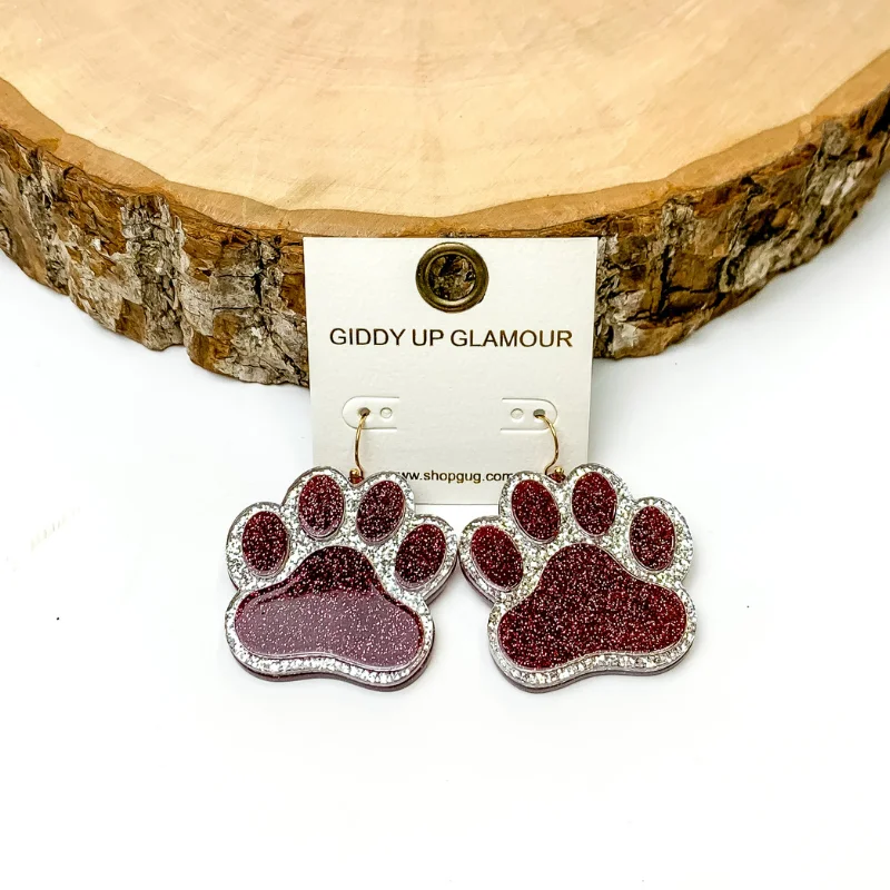 Women’s moonstone earrings-Glitter Paw Print Earrings in Maroon with Silver Glitter Outlining