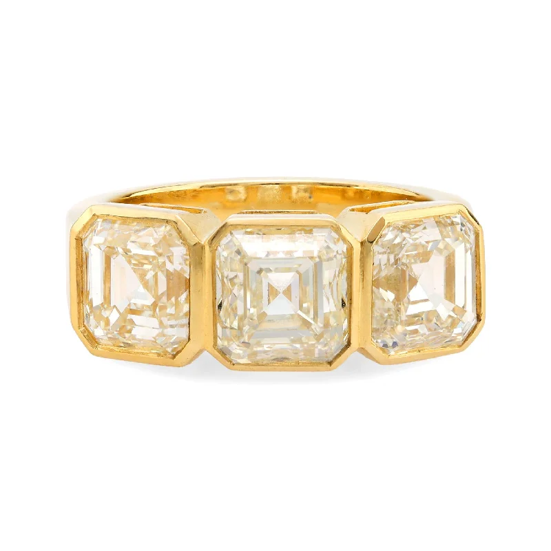 Women’s handmade rings-GIA 6.02 carat total weight Asscher cut diamond 18k yellow gold three stone ring