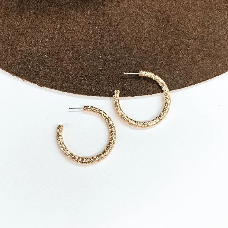 Women’s pearl stud earrings-Textured Medium Sized Hoop Earrings in Gold