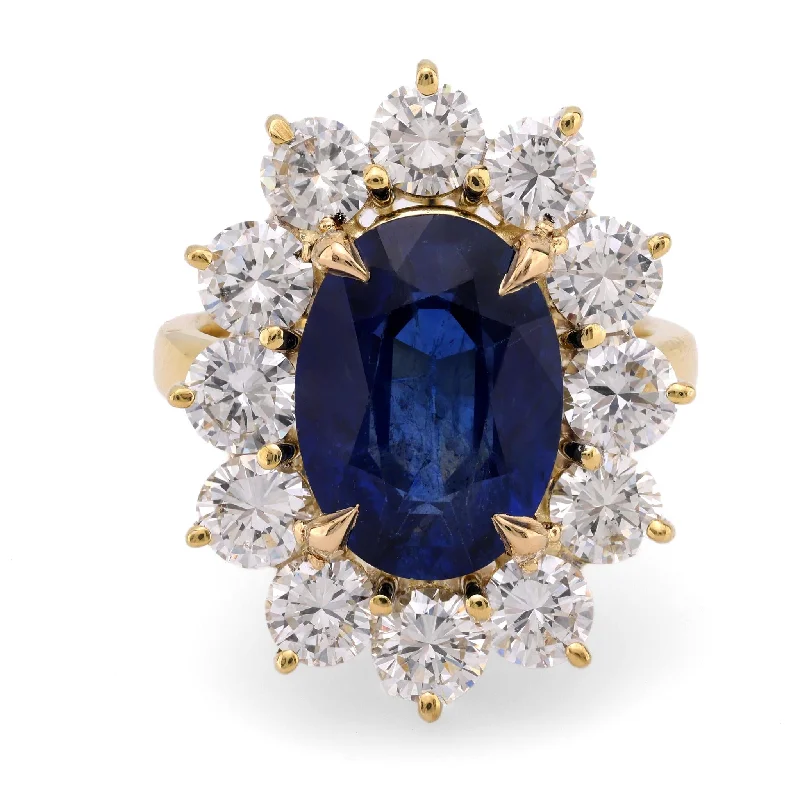 Women’s heart-shaped rings-GIA 4.84 carat oval cut sapphire diamond 14k yellow gold cluster ring