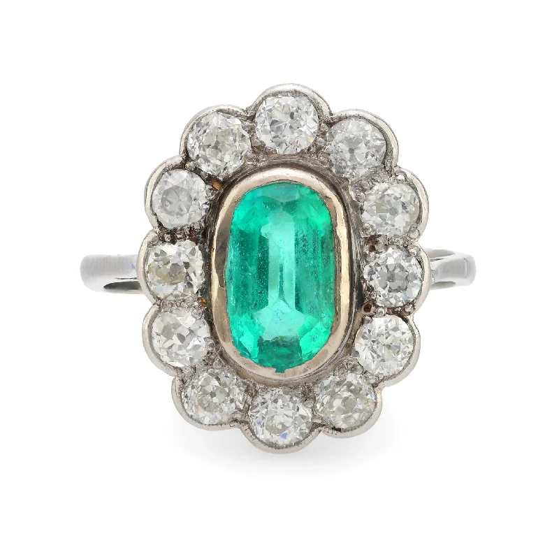 Women’s wedding rings-GIA 1.60 carat oval cut emerald diamond platinum cluster ring