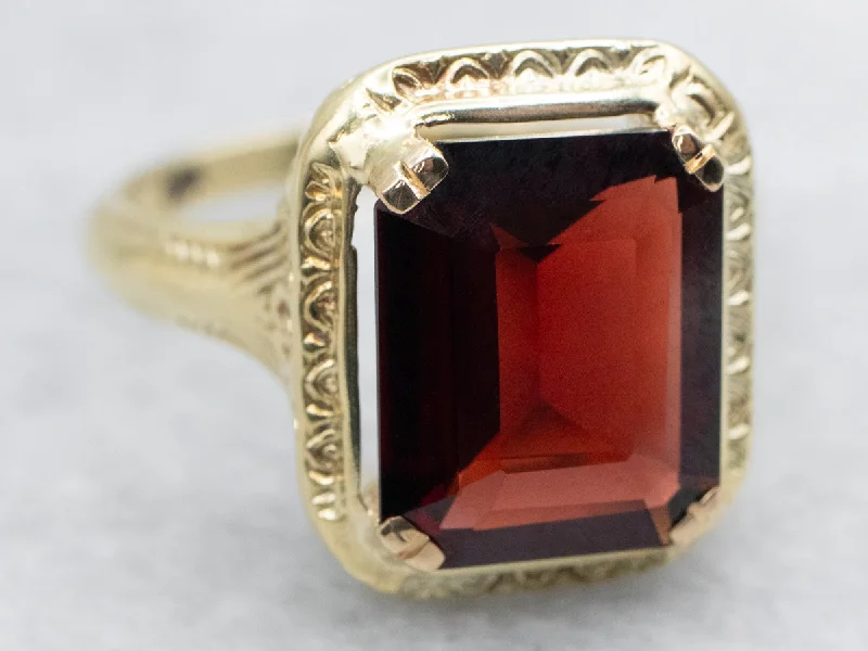 Patterned Frame Garnet Solitaire Ring