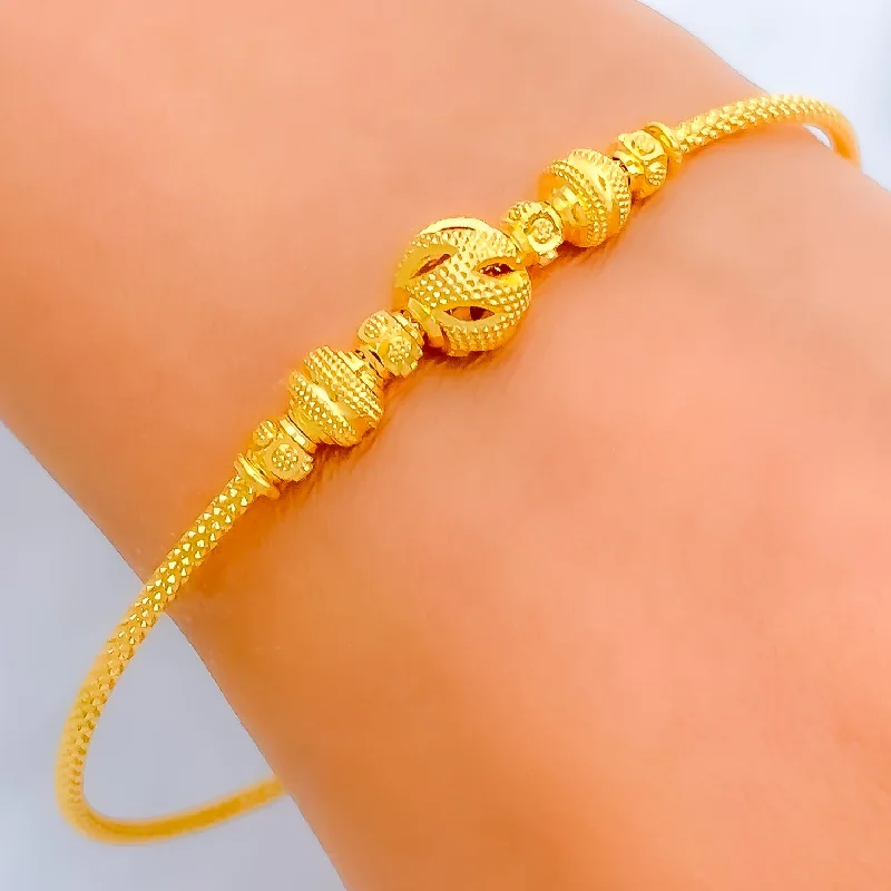 Women’s fashion bracelets-Lush Leaf Orb 22k Gold Bangle Bracelet