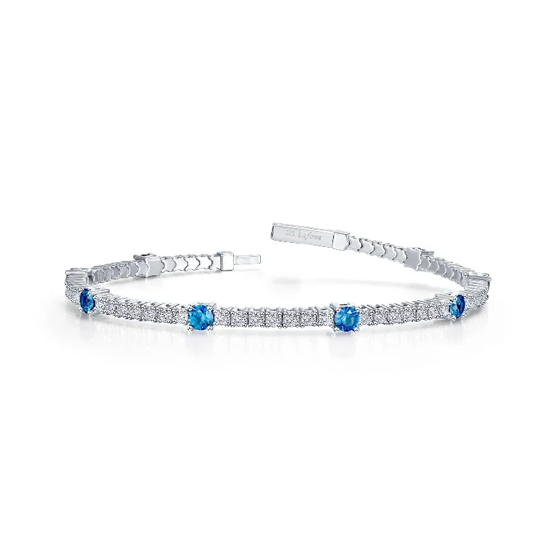 Women’s sterling silver stackable bracelets-Flexible Blue Topaz Bracelet in Sterling Silver